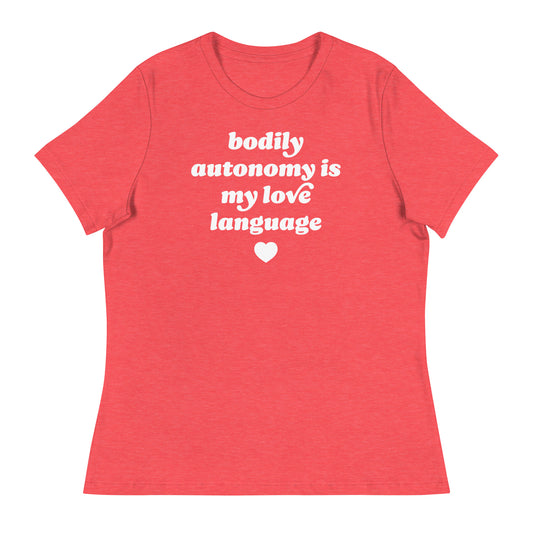 Women’s relaxed heather red t-shirt showcasing bold retro text “bodily autonomy is my love language” with heart motif, progressive apparel by Blue Wave USA.