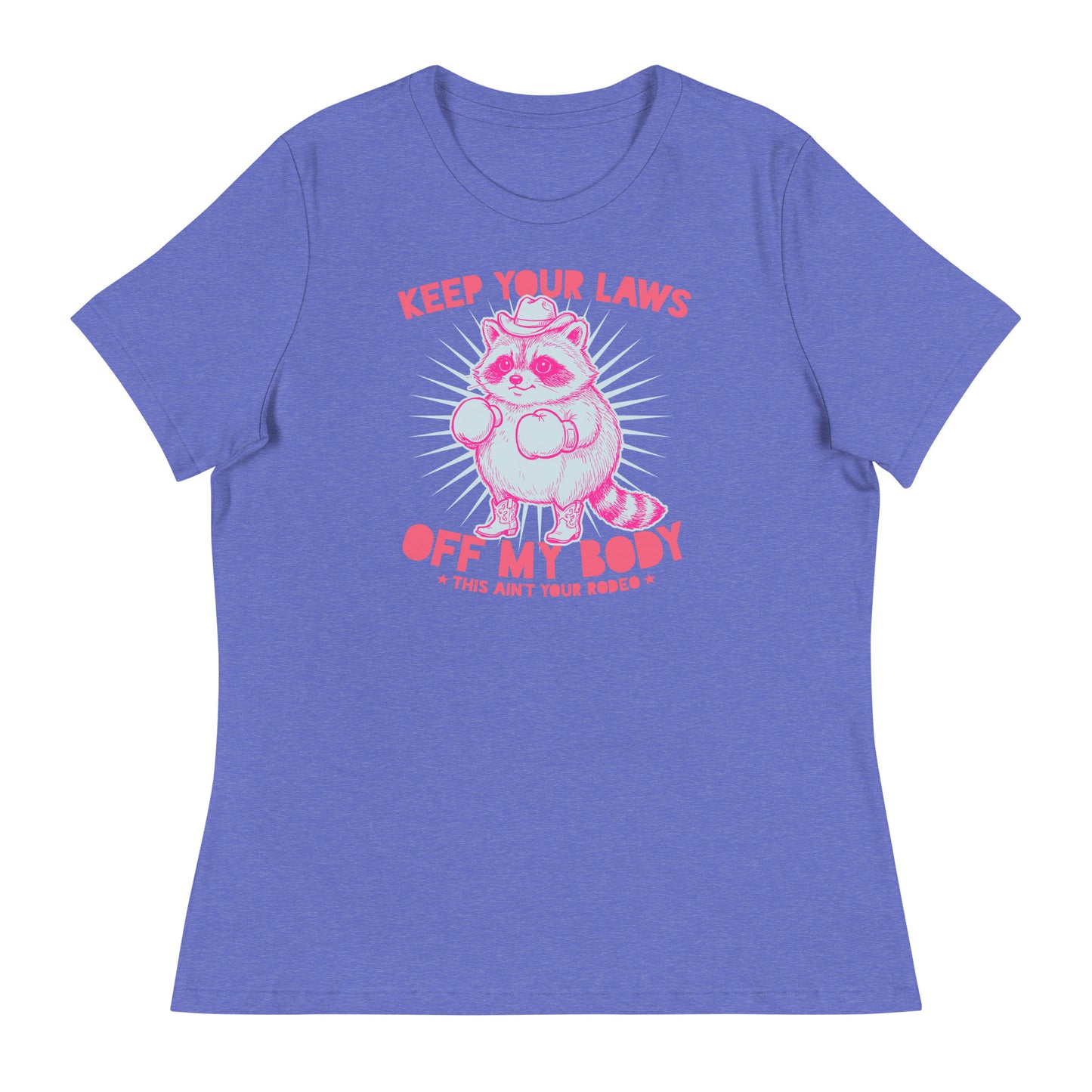 Heather blue women’s relaxed T-shirt displaying pink raccoon illustration and western protest slogan in playful reproductive rights style.