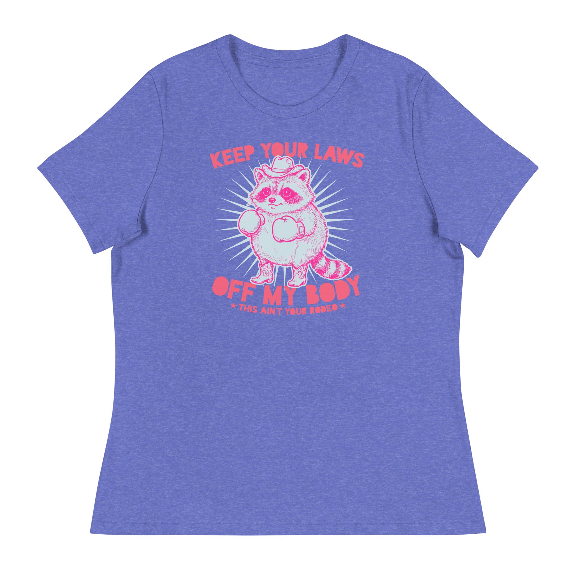 Heather blue women’s relaxed T-shirt displaying pink raccoon illustration and western protest slogan in playful reproductive rights style.