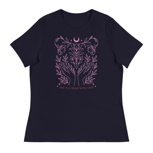 Navy women’s relaxed-fit t-shirt featuring a delicate pink line art design of hands, leaves, and a crescent moon with the phrase “There Is No Freedom Without Choice.”