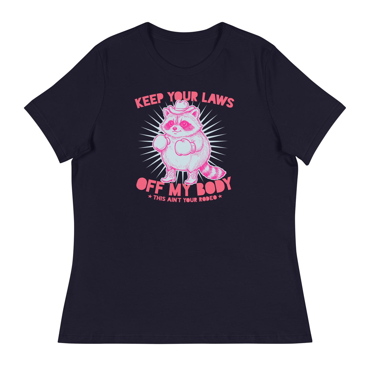 Women’s relaxed T-shirt featuring pink cowboy raccoon with “Keep Your Laws Off My Body” text, bold feminist protest graphic for reproductive rights apparel.