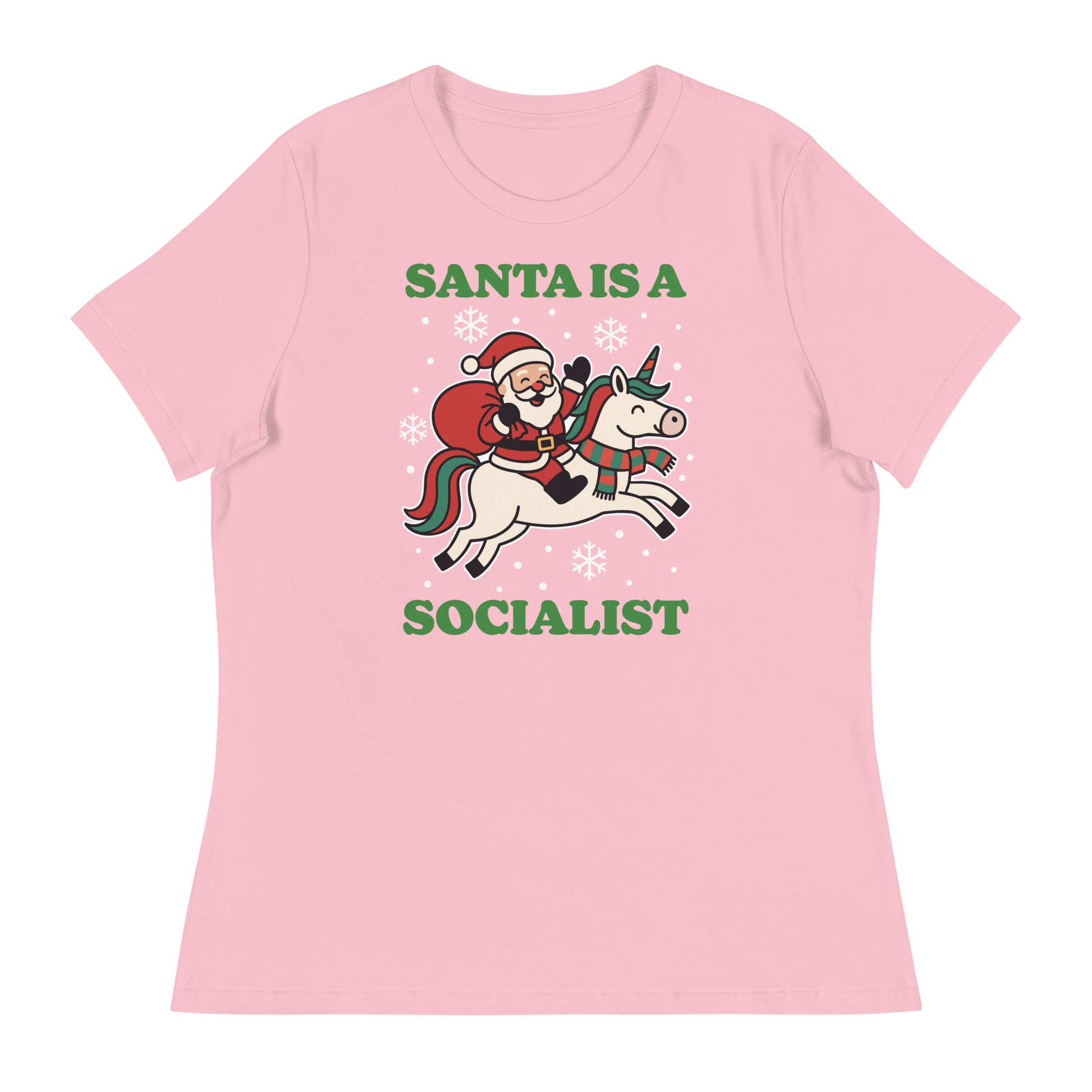 Light pink women’s relaxed t-shirt with a vintage Santa riding a unicorn illustration, decorative stars, and the printed phrase “SANTA IS A SOCIALIST,” created by Blue Wave USA.