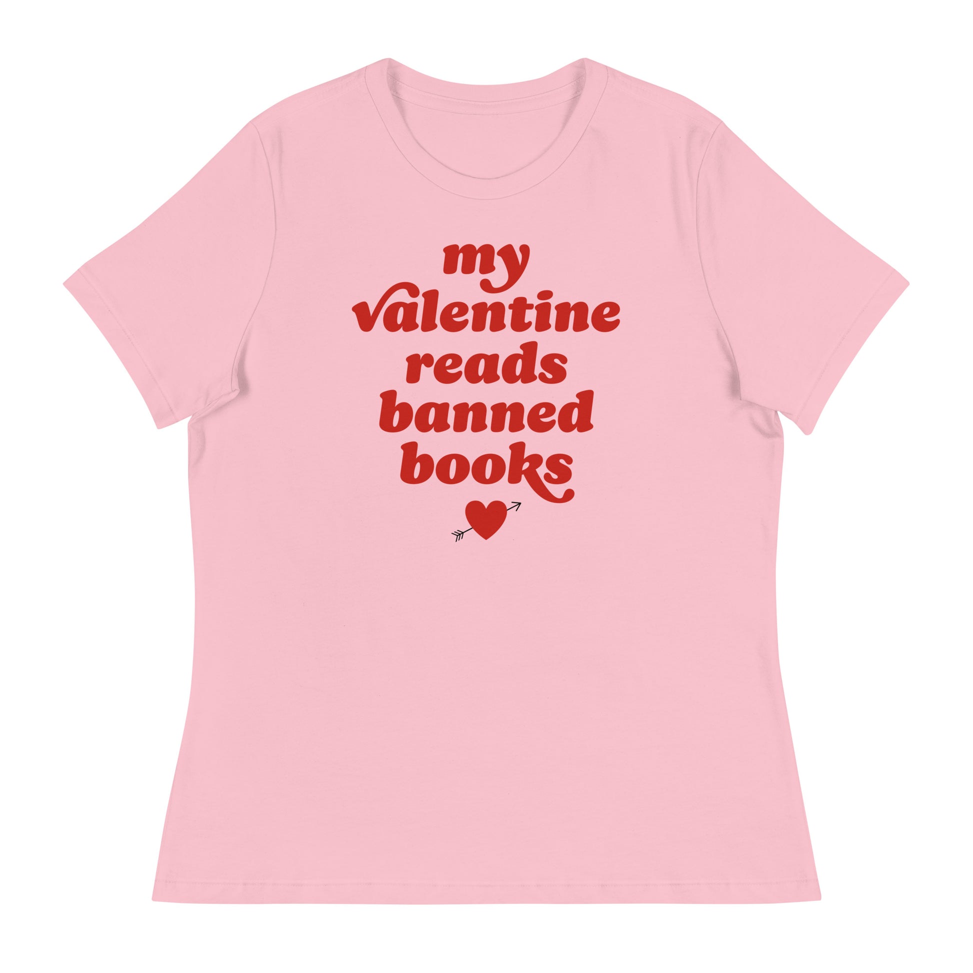 Women’s relaxed t-shirt in soft pink featuring the phrase “my valentine reads banned books” with heart graphic, a progressive Valentine statement celebrating reading freedom.
