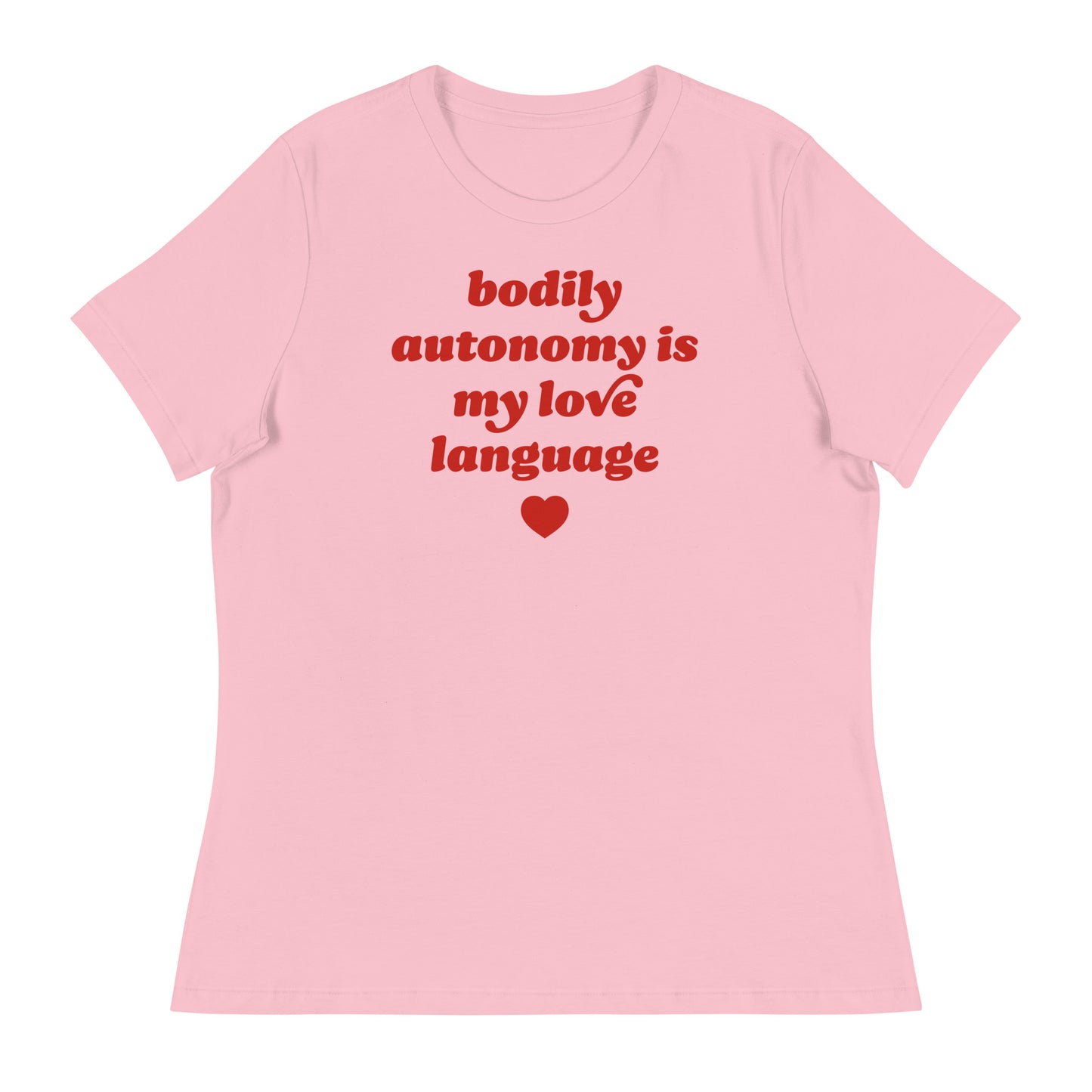Women’s relaxed t-shirt in soft pink featuring retro red typography and heart graphic reading “bodily autonomy is my love language,” a progressive Valentine justice-focused design.