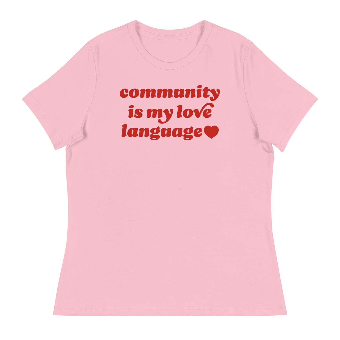 Women’s relaxed t-shirt in soft pink featuring retro red typography and heart icon reading “community is my love language,” a progressive Valentine design centered on political activism.
