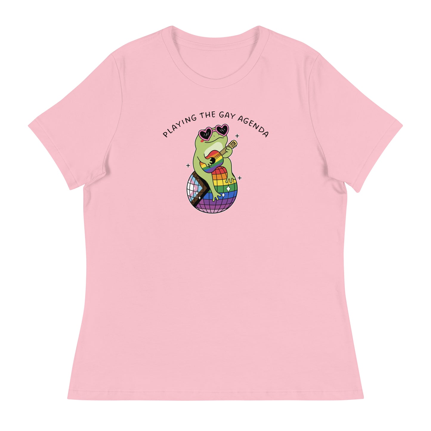 Pink women’s relaxed t-shirt showcasing a frog playing guitar on a rainbow disco ball with vibrant LGBTQ+ pride artwork and retro disco vibes.