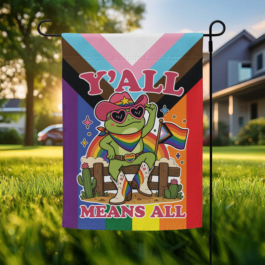 Garden flag featuring a rainbow cowboy frog in heart-shaped sunglasses holding a pride flag against a colorful Pride-inspired background with bold “Y’All Means All” message.